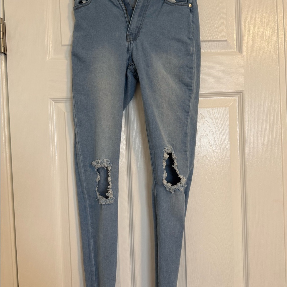 Light Blue Ripped Women's Jeans - Classic Skinny Fit